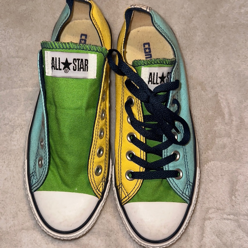 Colorful converse sneakers. They are a woman’s size 7 and men’s size 5